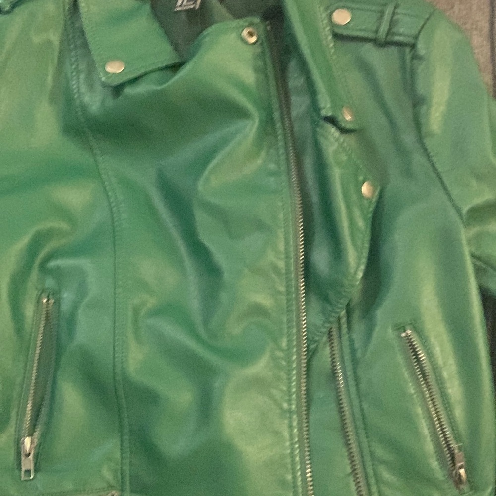 Get ready for the cool fall weather with this green leather jacket